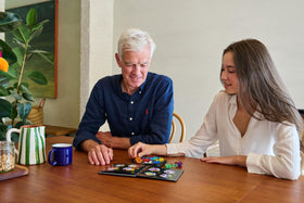 SmartGames IQ Deluxe ages 14 plus—designed for teens and adults.