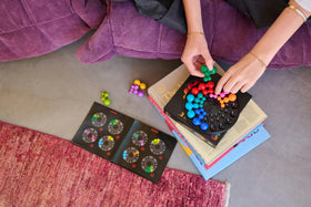 SmartGames IQ Deluxe Circle gift packaging suggests premium portable puzzle gift.