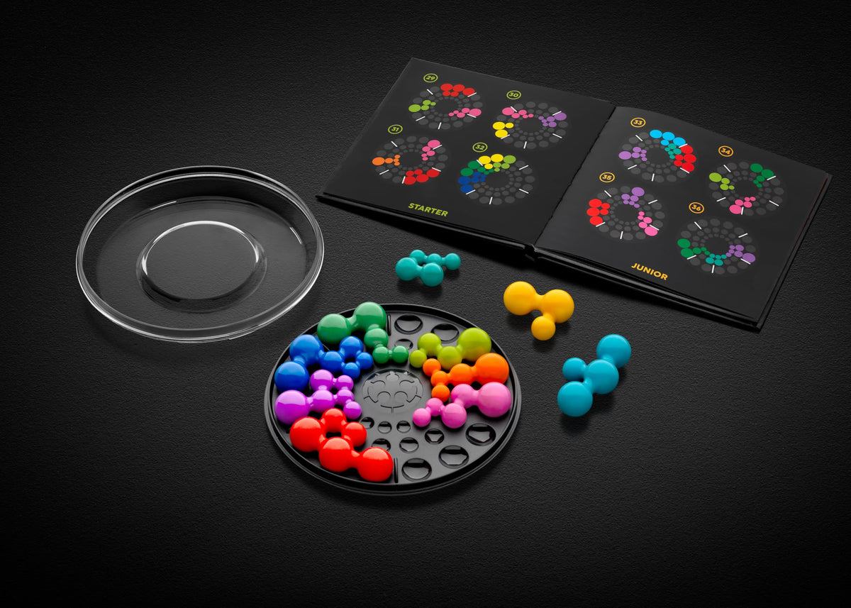 SmartGames IQ Deluxe Circle pieces arranged for hands-on spatial reasoning.