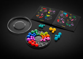 SmartGames IQ Deluxe Circle pieces arranged for hands-on spatial reasoning.