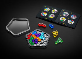 SmartGames IQ Deluxe travel case featuring the compact puzzle system.