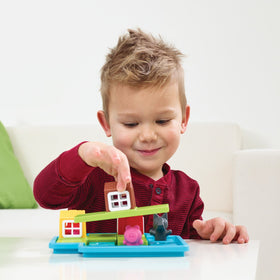 SmartGames Three Little Piggies puzzle pieces arranged for early problem-solving