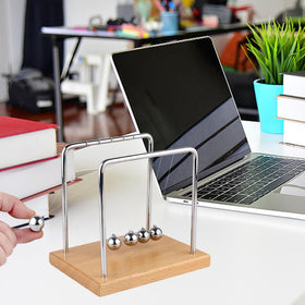 Smilesorg Newton's Cradle gifts inspire learning for science lovers and students.