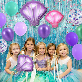 SNLN balloon arch accessories help frame the party centerpiece.
