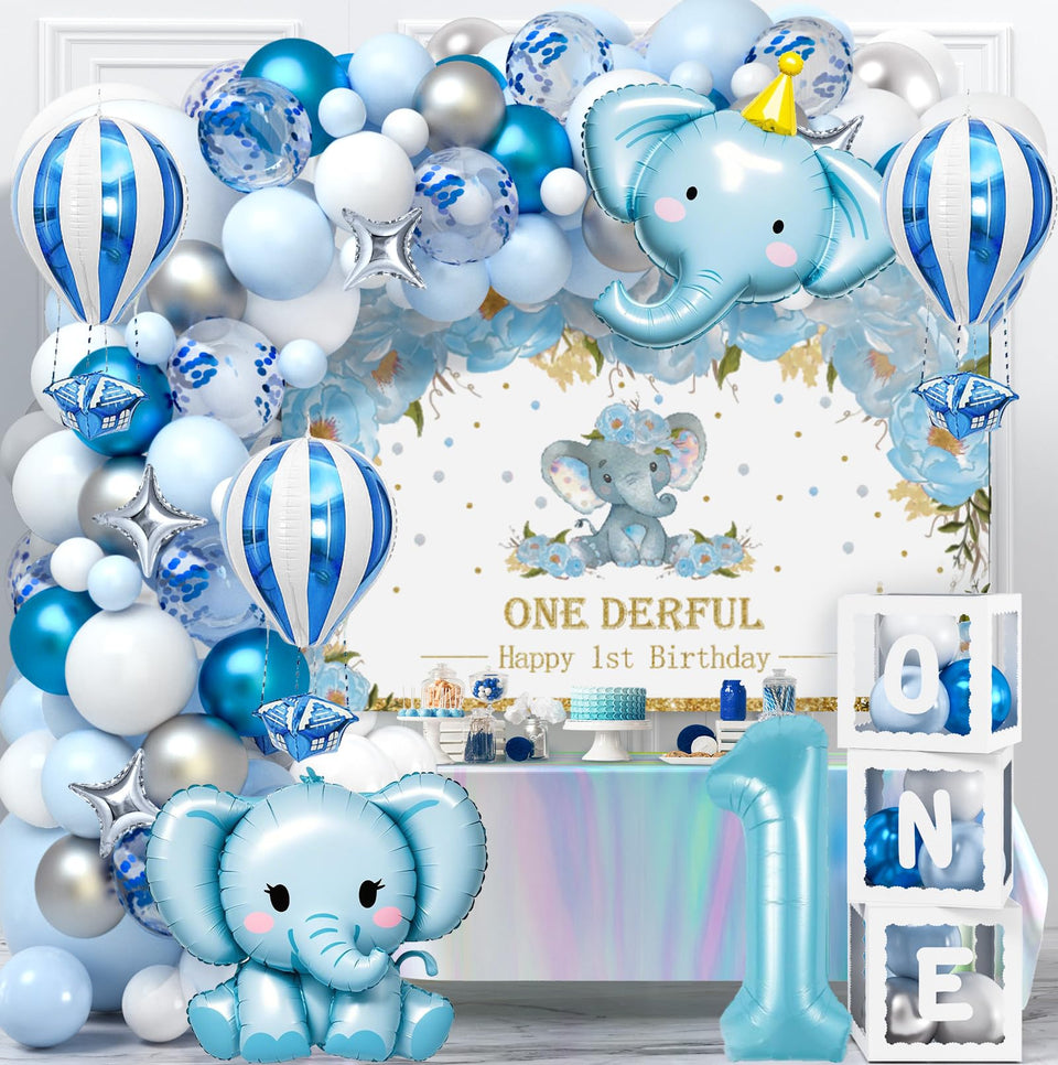 SNLN elephant 1st birthday backdrop sets the cake table in blue and white tones