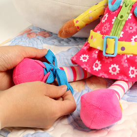Snuggle Stuffs Sugar Snap braids invite imaginative play and dressing.