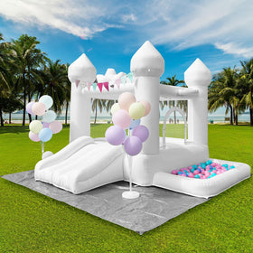 SnuggleBounce outdoor setup with the white bounce house enhances backyard celebrations