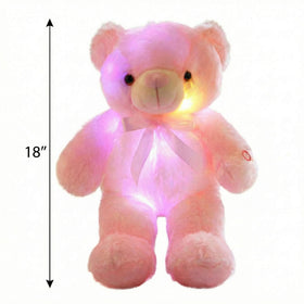 Sofipal teddy bear night light in a cozy bedroom setting.