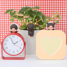 Monchhichi Hippers on photo frame adds charm to display