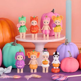 Sonny Angel Pumpkin Patch Frog figure in pumpkin outfit for playful desk decor