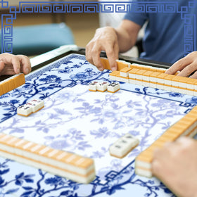 Sonwyoung chinoiserie mahjong mat blue design, elegant motif enhances table aesthetics.
