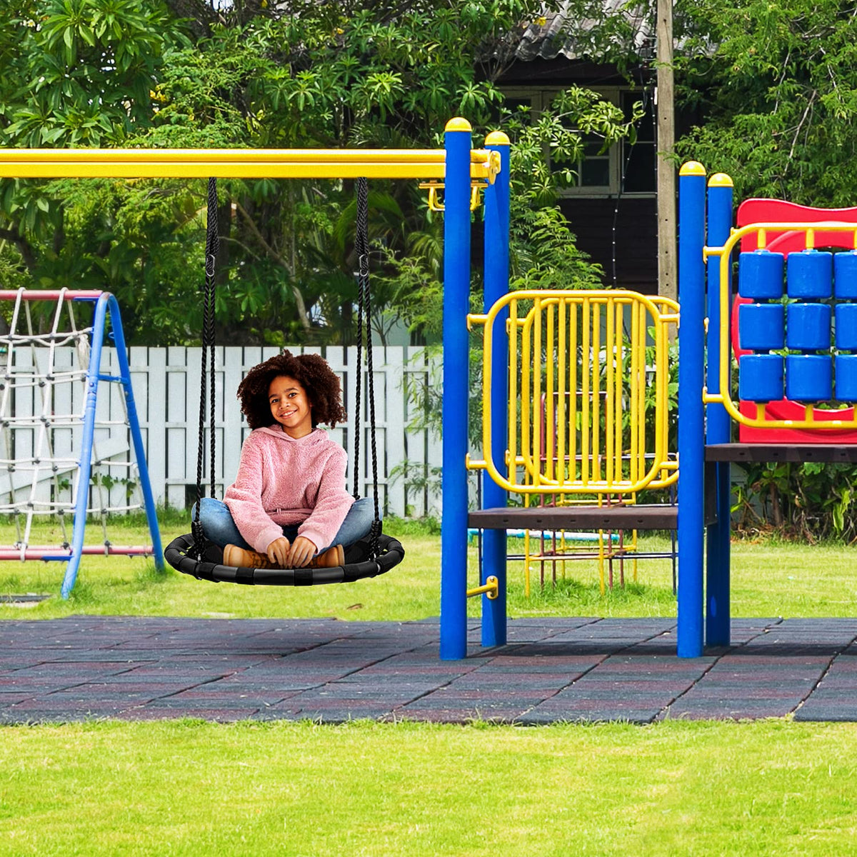 Sorbus Saucer Tree Swing assembly guide shows quick setup for hours of outdoor fun.
