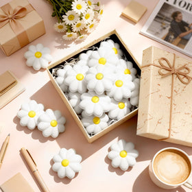 Soulchen daisy stress ball in-hand use for relaxation during breaks.