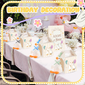 Soulchen geese wearing party hats create whimsical centerpieces.