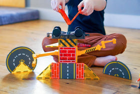 Soyee magnetic tiles enhance fine motor skills through precise placement.