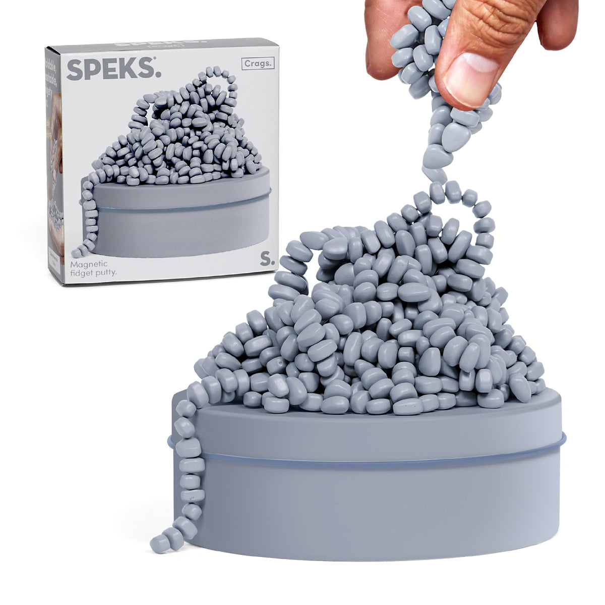 Speks Crags ferrite stones in a tin provide tactile stress relief on the desk.