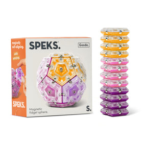 Speks Geode sphere magnet toy on desk for focus and tactile fun.