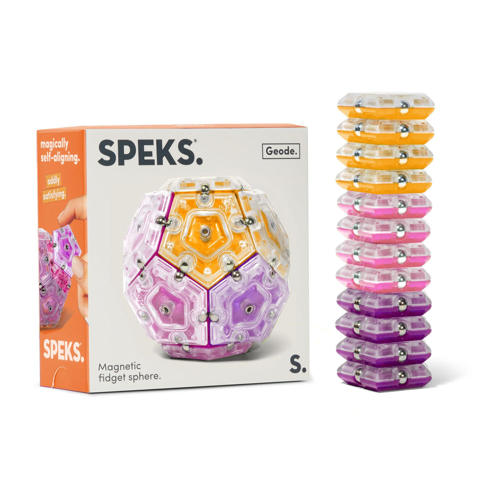 Speks Geode sphere magnet toy on desk for focus and tactile fun.