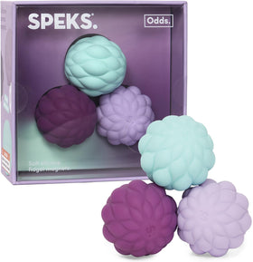 Speks Odds soft silicone fidget magnets on desk for quiet stress relief.