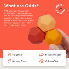 Speks Odds orange ball magnets in action, playful stacking and creativity