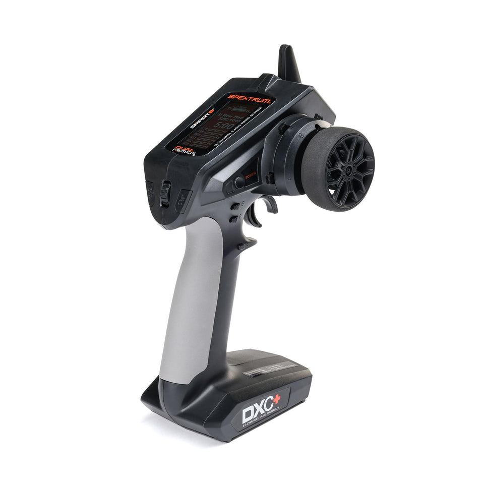 Spektrum DXC+ transmitter dock for organized pit setup and charging.