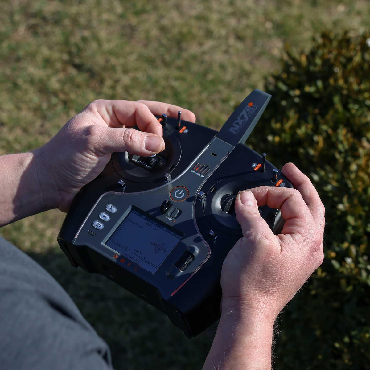 Spektrum NX7e+ Black Edition display close-up showing the 2.8-inch color screen.