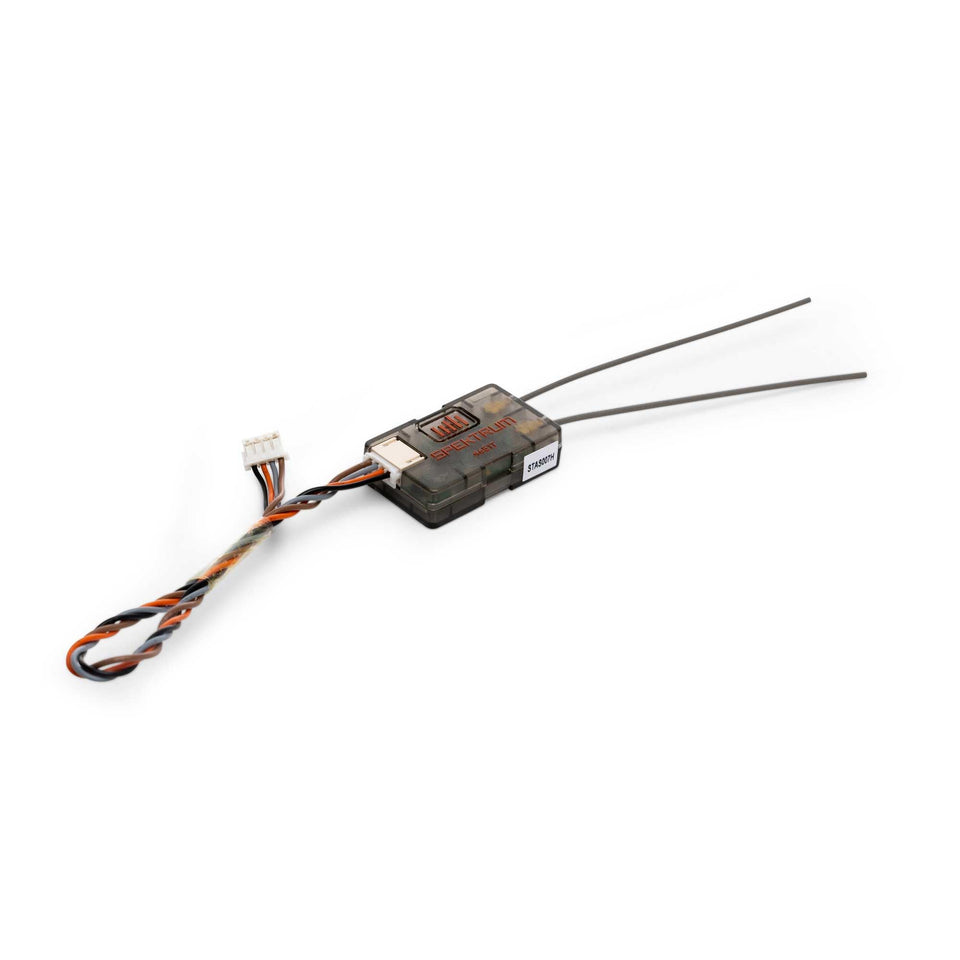 Spektrum SRXL2 receiver shown small and compact for tight-space FPV builds.