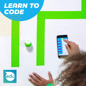 Sphero Mini Green drag-and-drop coding interface highlights beginner-friendly programming.