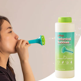 Children enjoy bubbles indoors with SPIKE Innobaby solution and wand.