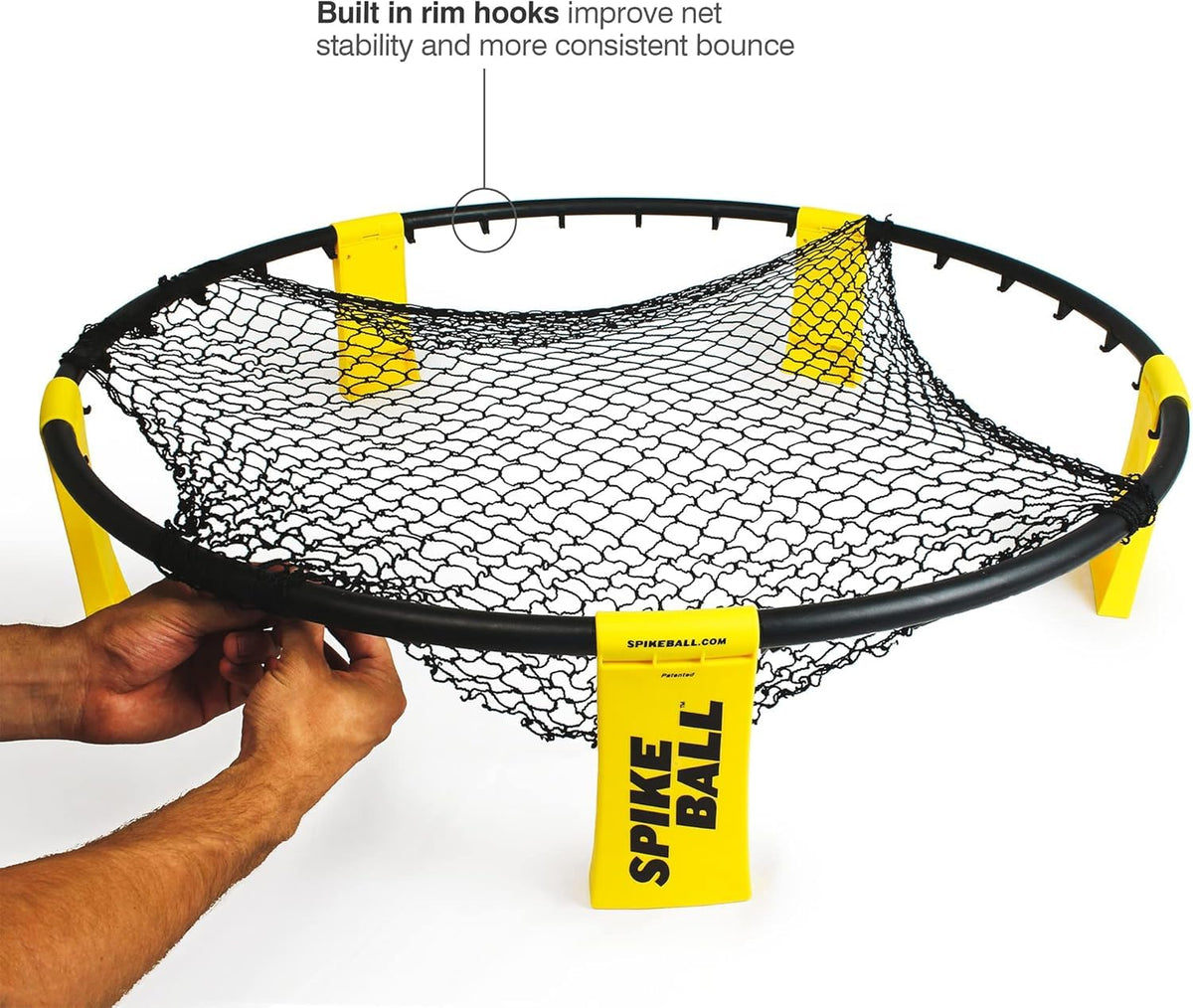 Spikeball net in use on grass, promoting fast, active play.