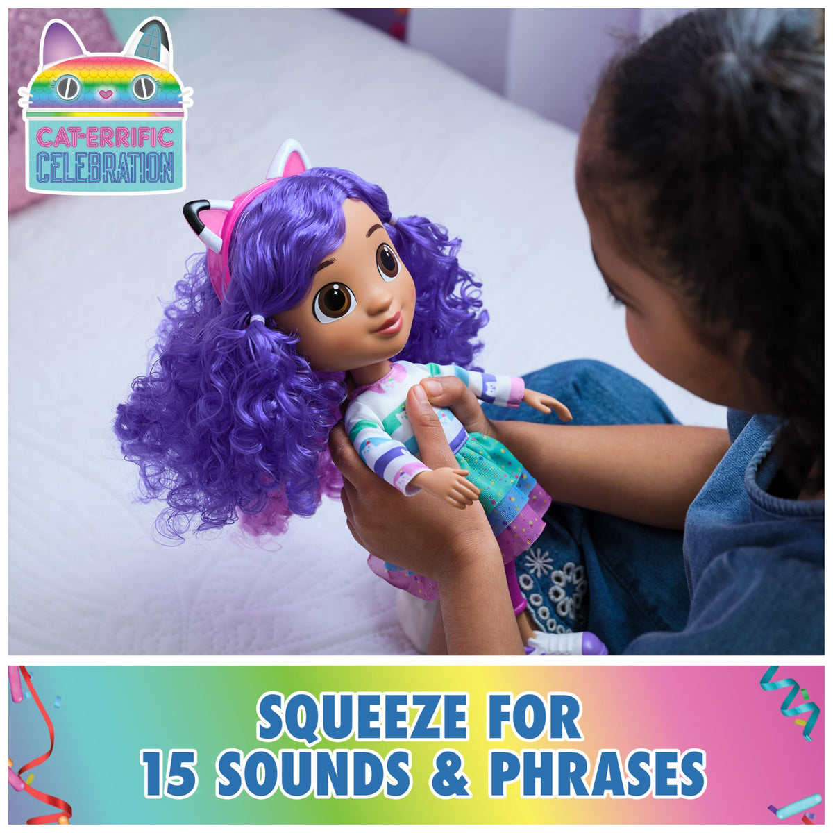 Gabby doll wearing kitty headband with reversible ears for interactive transform.
