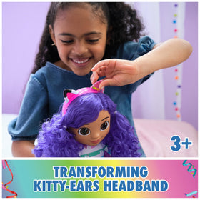 Gabby doll with reversible ears for party-to-cat ear play transformations.