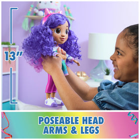 Gabby doll chest button triggers show-inspired sound effects for immersive play.