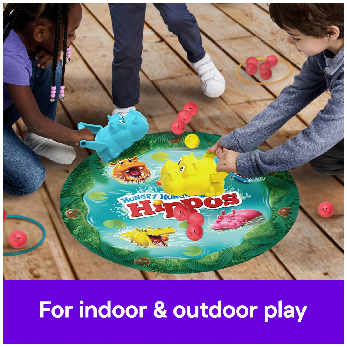 Spin Master Games Hungry Hungry Hippos Giant Edition hippo-chomp-action captures dynamic chomp motion.