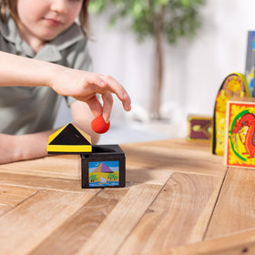 Spin Master Melissa and Doug deluxe wooden magic set includes the number prediction trick for audience engagement.