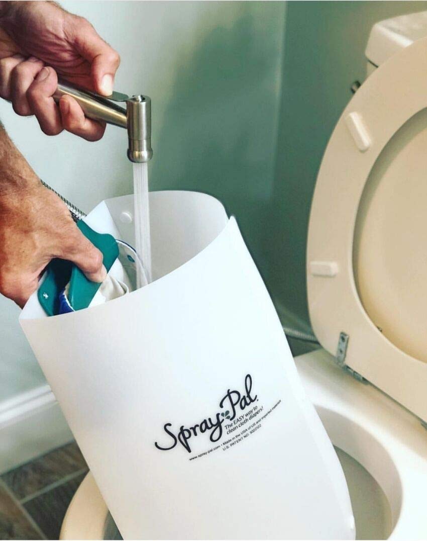 Spray Pal strong clip delivers 20-pound clamping force for secure diaper handling.