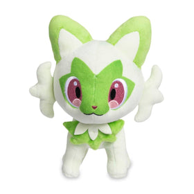 Sprigatito plush embroidery details highlight cute facial features for display.