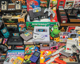 Springbok Gamer's Trove 1000-piece puzzle front view with retro gaming collage