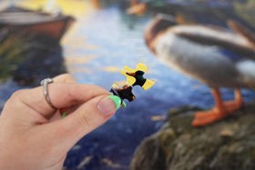 Springbok Mallard Morning Glow puzzle piece closeup highlights unique cuts