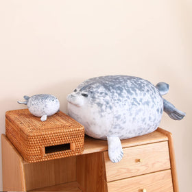 SQEQE chubby seal pillow belly-zipper shows removable seals for play.