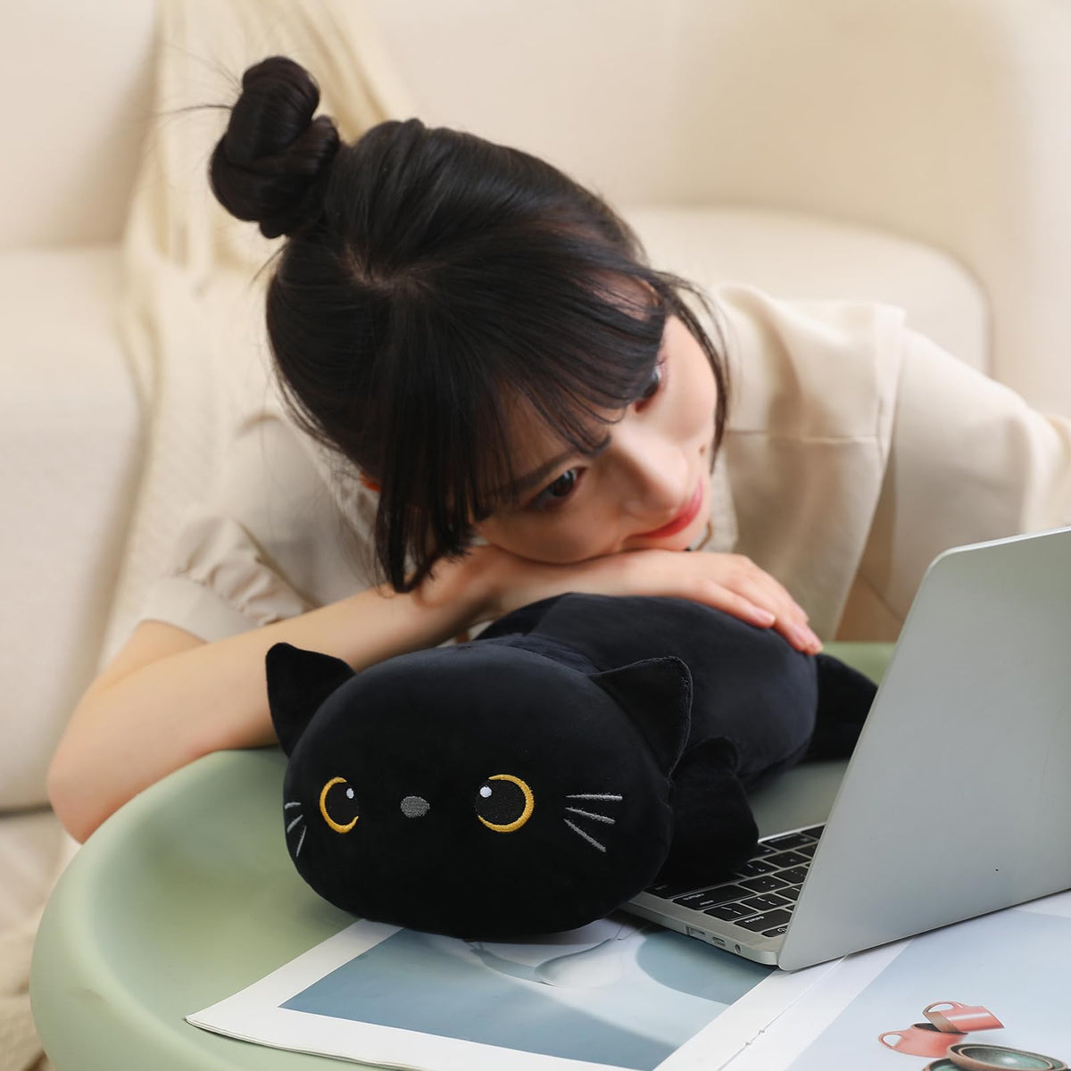 SQEQE weighted black cat plush vacuum packaging ready to unfold.