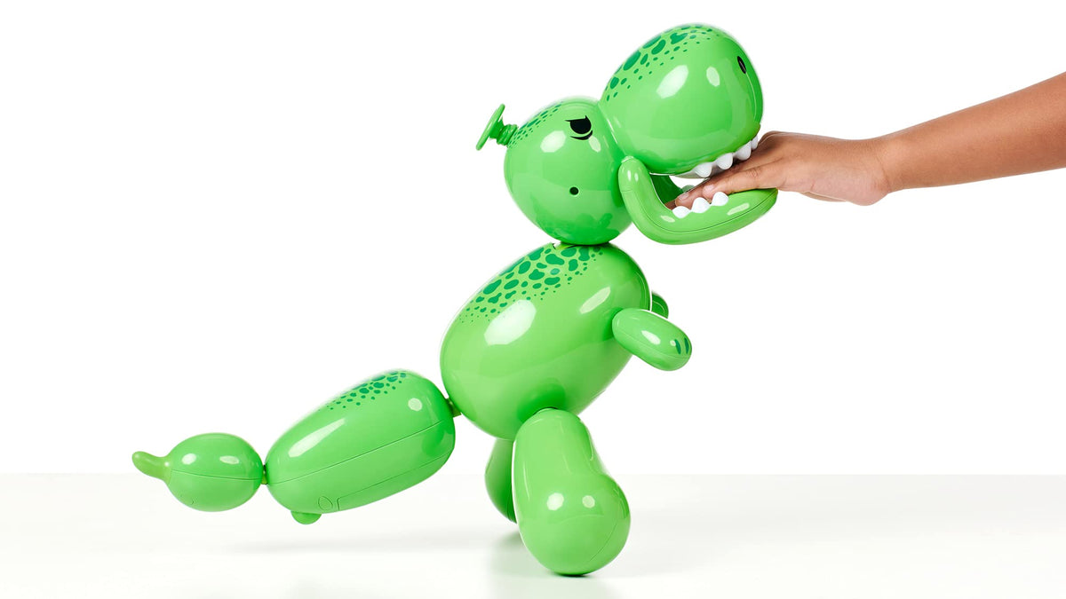 Squeakee Dino roars and reacts to sounds for responsive moments