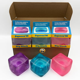 Squeez'M Big Block Cube front view with vibrant colors for engaging sensory play