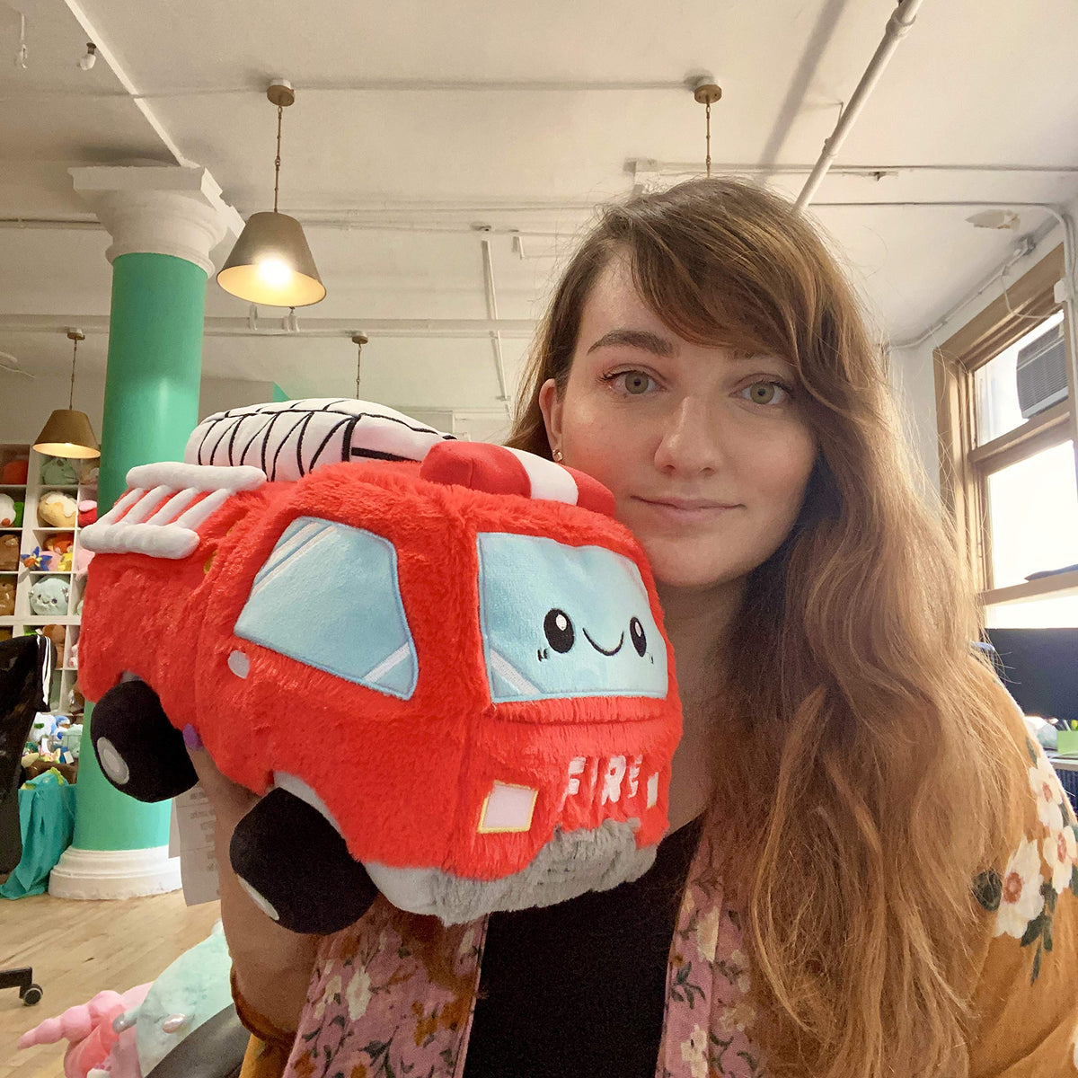 Squishable GO! Fire Truck 12-inch close-up fur, ultra-soft texture ideal for cuddles and display.