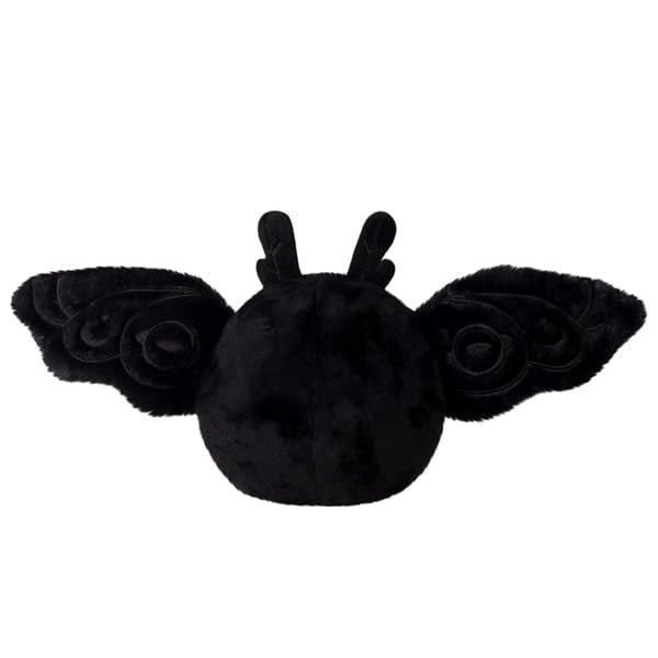 Squishable Snugglemi Snackers Baby Mothman resting on a desk setup