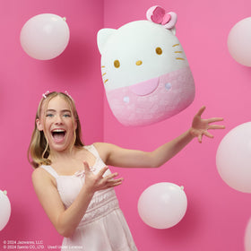 Side view of Squishmallows Hello Kitty embossed plush highlighting durable stitching.