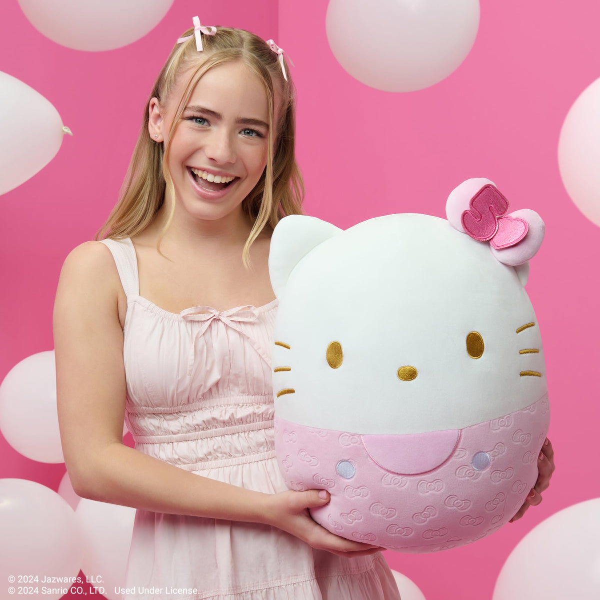 Close-up of ultrasoft material on Squishmallows Hello Kitty plush.