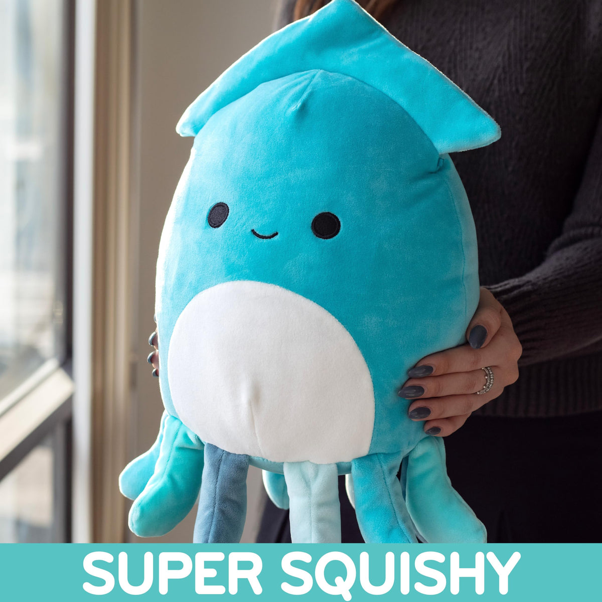 Squishmallows Sky graduation squid plush, face close-up, premium softness for comforting moments.