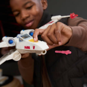 Star Wars ship launching projectiles with button press