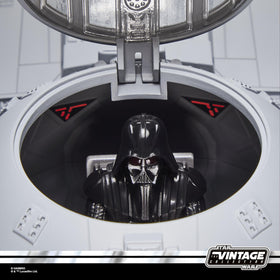 Packaging cardback recalling the original Kenner era